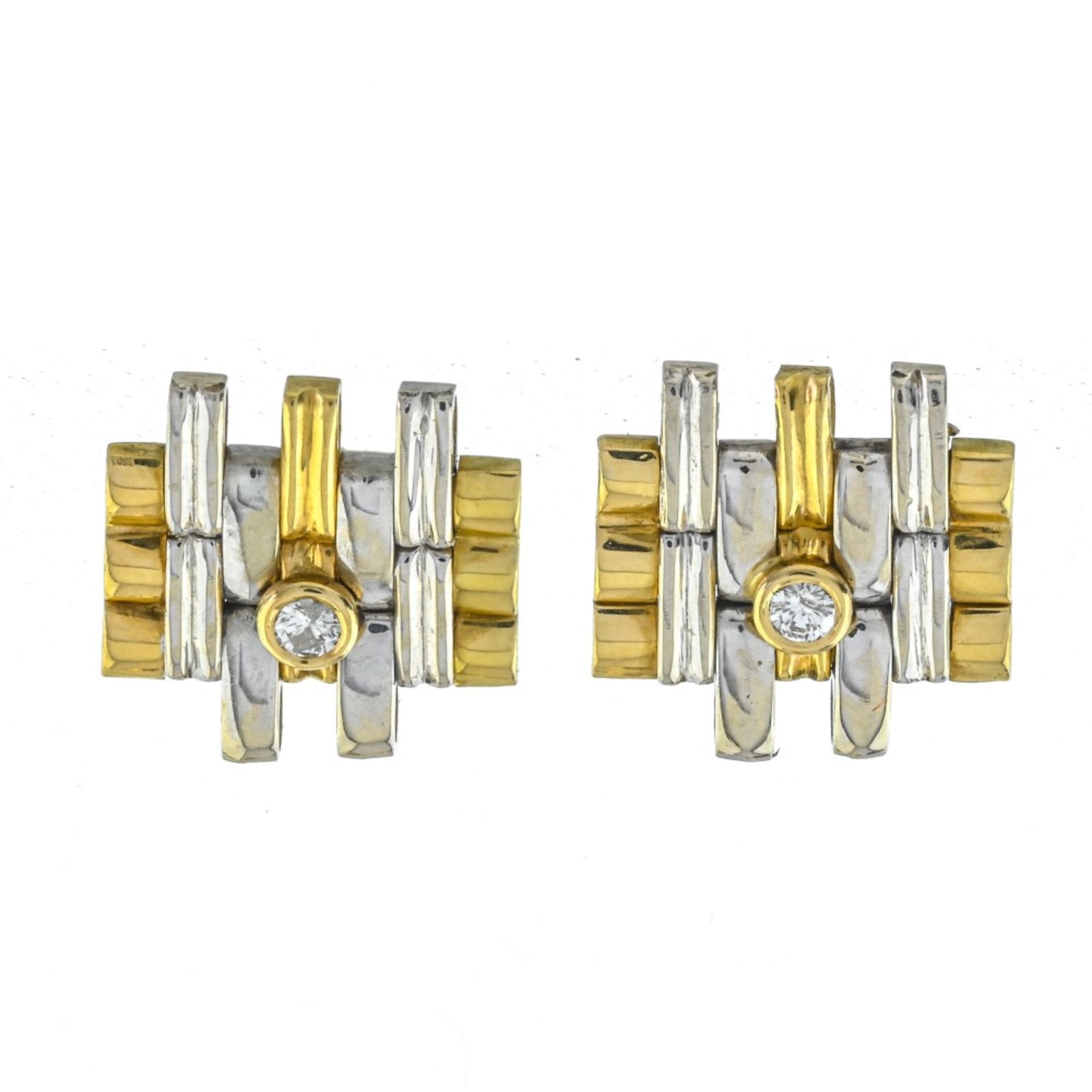 Modernist earrings 14 Karat gold, yellow and white gold wires intertwined to form a geometric