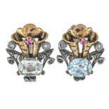 Earrings set with aquamarine Earrings figuring stylized flower, in pink gold and white gold 14