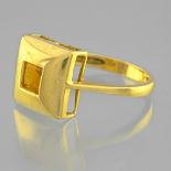 Modernist ring Ring in yellow gold 18 Karat decorated with an orange garnet (Hessonite) of square