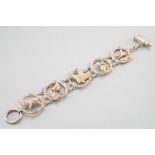 Silver bracelet with hunting decoration decorated with five animal motifs in relief. Clasp with a