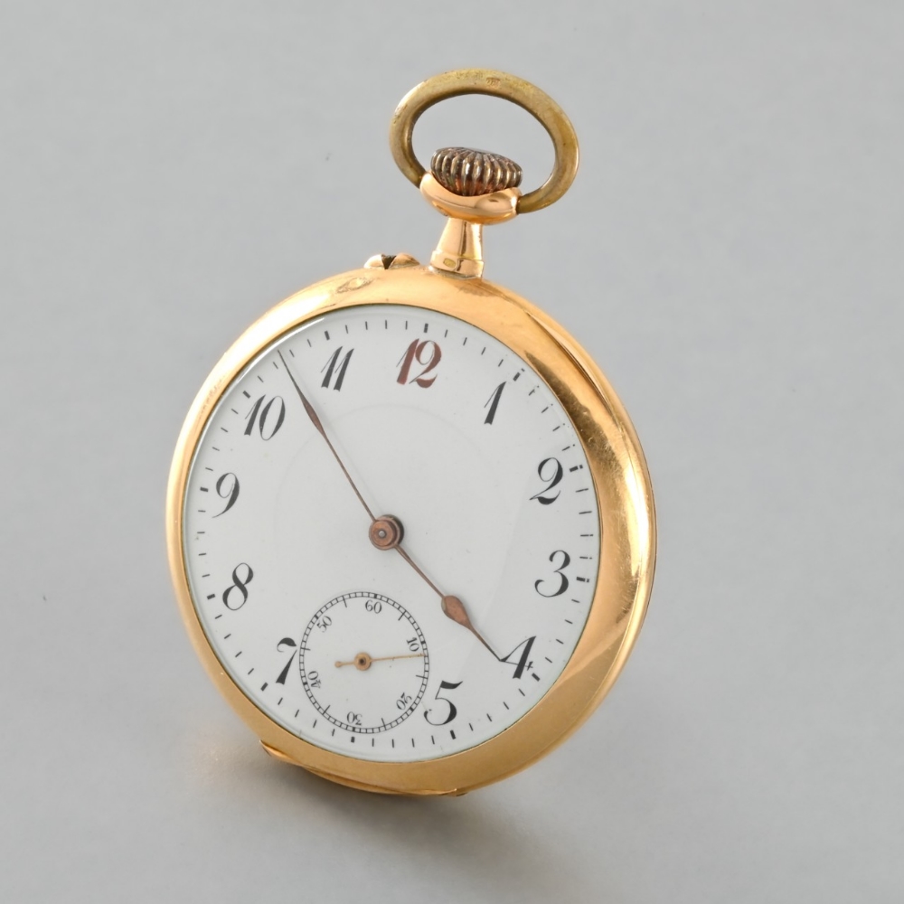 Golden pocket watch in its shrine Open dial pocket watch in yellow 18-carat gold. White enamel dial,