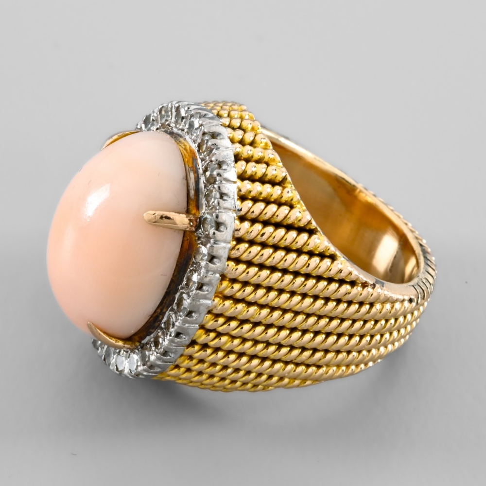 WORK CIRCA: 1950-1960 Cocktail ring set with a coral cabochon In yellow 18-carat gold, set with an - Image 4 of 5