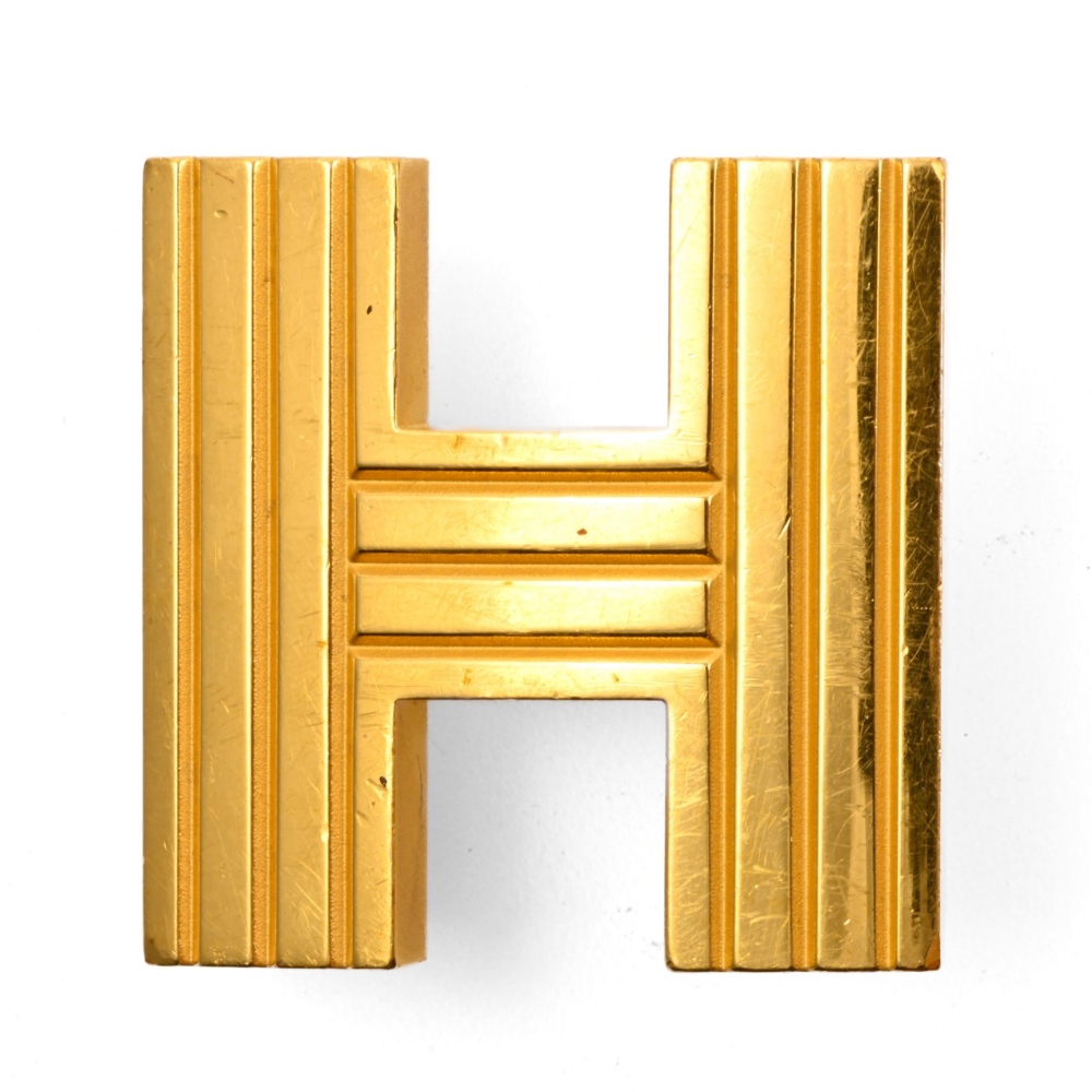 "Constance" belt buckle with stripes HERMES In gilded metal. Brushed interior. Some scratches. H: 42