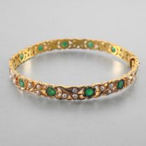 Oriental-style bracelet. Semi-articulated and crafted in yellow 14-carat gold, set with twelve round