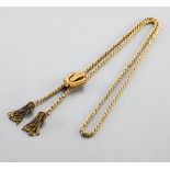 Necklace in yellow gold In yellow 14-carat gold, twisted necklace finished with two pendants. A