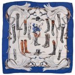 Twill scarf "A propos de bottes". HERMES 90 cm scarf in twill silk, white background and blue frame,