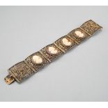 PORTUGUESE WORK, LATE 19TH - EARLY 20TH CENTURY Filigree bracelet In gilt, comprising six
