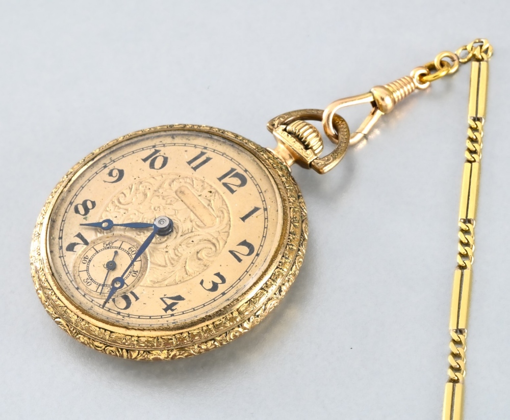 Pocket watch and chain. In gilt metal, diameter 4.2 cm, case included. Dial with exposed gold