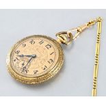 Pocket watch and chain. In gilt metal, diameter 4.2 cm, case included. Dial with exposed gold