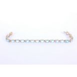 14K Gold & Blue Topaz Tennis Bracelet