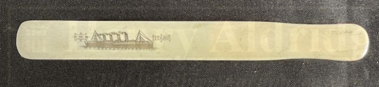R.M.S. TITANIC: Unusual ivorine letter opener showing R.M.S. Titanic on one side and 45000 tons
