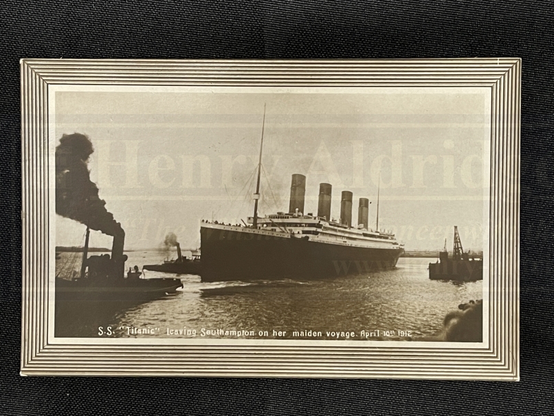 R.M.S. TITANIC: Rare pre-sinking real photo postcard of Titanic leaving Southampton.