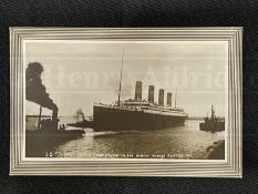 R.M.S. TITANIC: Rare pre-sinking real photo postcard of Titanic leaving Southampton.