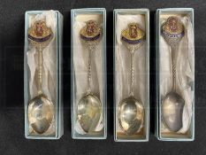 OCEAN LINER/CUNARD: Set of four boxed R.M.S. Queen Elizabeth enamelled shipboard souvenir spoons.