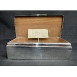 WHITE STAR LINE/R.M.S. TITANIC: A unique hallmarked silver cigarette box presented to Mr F.V. Palmer