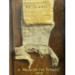R.M.S. TITANIC: Extremely rare life jacket cork section with handwritten notation reads in part, '