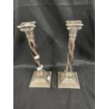 19th/20th cent. Silver plate on copper Corinthian column candlesticks, a pair. 13¼ins.