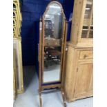 Early 20th cent. Mahogany and maple full length mirror on arched supports. 63ins. x 16½ins.