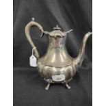 Hallmarked Silver: Coffee pot melon shaped body on four claw feet, hallmarked Sheffield. 22.84oz.