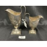 Hallmarked Silver: Helmet jugs one milk hallmarked Chester, one cream hallmarked London. Total