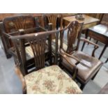 19th cent. Mahogany pierced back carver, plus four other period dining chairs.