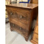 Regency inlaid feathered mahogany commode with lift up top, crossbanded with ebony line, with four