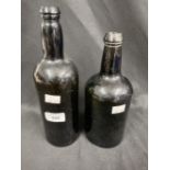 19th cent. Green wine/ale bottles. 11ins. and 10ins.