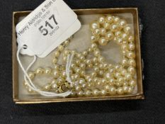 Jewellery: Necklet, a double row of graduated cultured pearls (73, 70), size of pearls 7mm to 3.