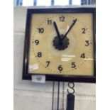 Clocks: Early 20th cent. Wall clock with glass face and Arabic numerals.