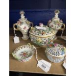 Dresden porcelain to include a pierced basket and lid encrusted with flowers, a smaller lidded and