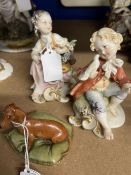 20th cent. Ceramics: Crown Naples boy holding bird, girl with basket of flowers. Plus dachschund