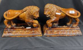 19th cent. Ceramics: English treacle ware one lion a paw on ball and small military figure