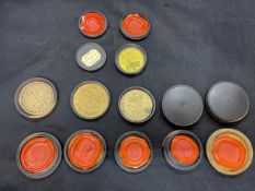 19th cent. Lignum Vitae cased wax seals, various London makers. Sizes range from 1ins. to 1½ins. (9)