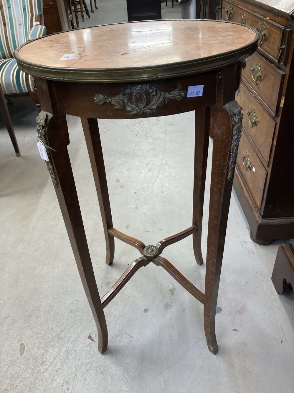 Late 19th cent. French marble top plant stand the round top with brass rim on four legs with brass