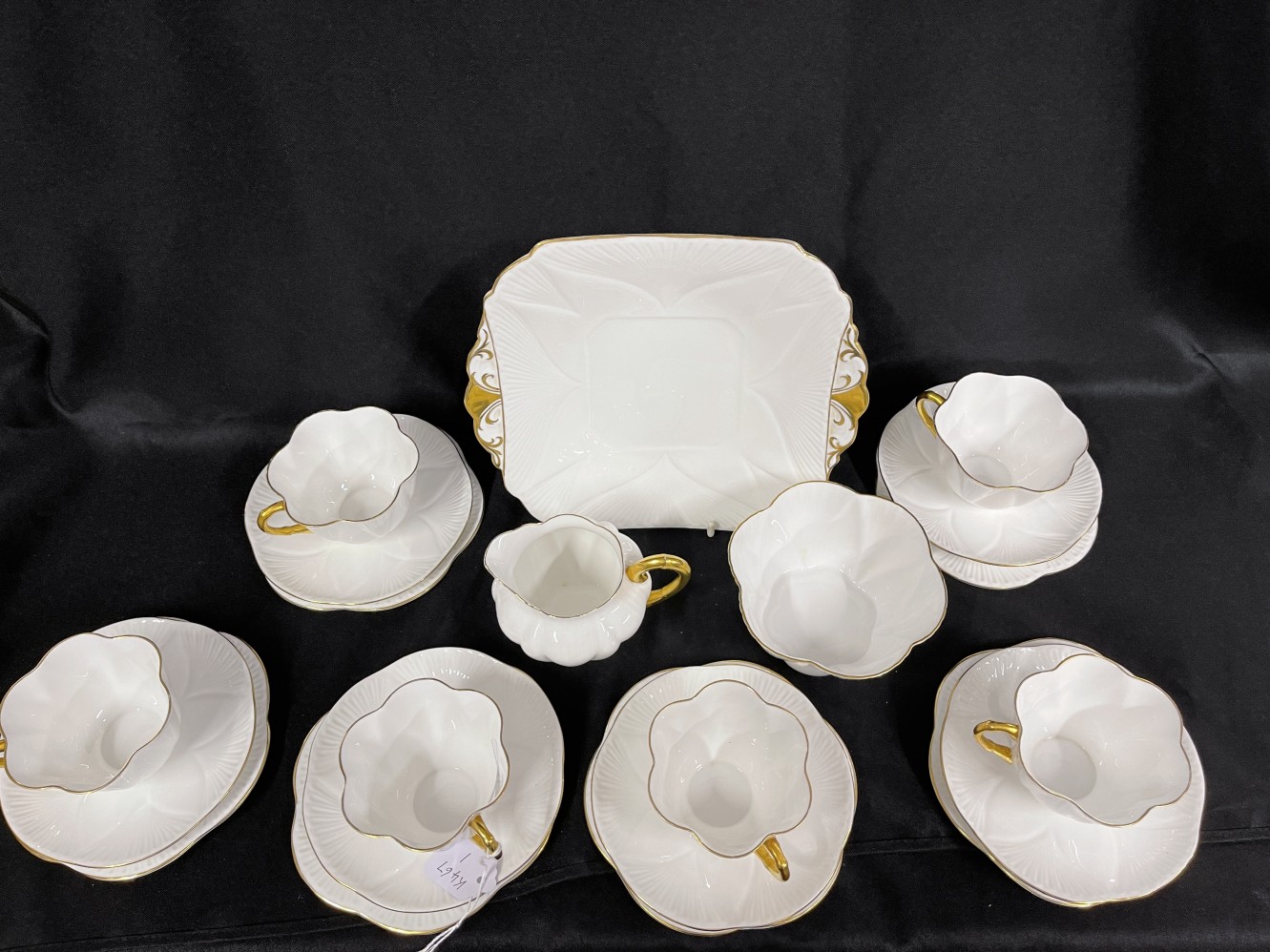 20th cent. Ceramics: Shelley 'Dainty' white and gilt tea china, six cups, saucers and side plates,