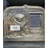 Hallmarked Silver: Photograph frame embossed with the figure of a golfer. Hallmarked London 1986,