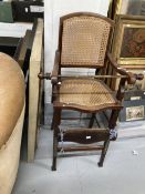 19th cent. Mahogany children's highchair with willow weave seat and back and adjustable foot rest.