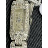 Watches: Platinum and diamond Art Deco cocktail watch, rectangular silver coloured dial, estimated