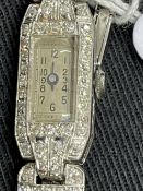 Watches: Platinum and diamond Art Deco cocktail watch, rectangular silver coloured dial, estimated