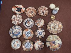 19th cent. Japanese Imari plates to include circular plate with fans and fish 12ins, octagonal plate