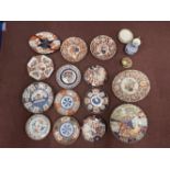 19th cent. Japanese Imari plates to include circular plate with fans and fish 12ins, octagonal plate