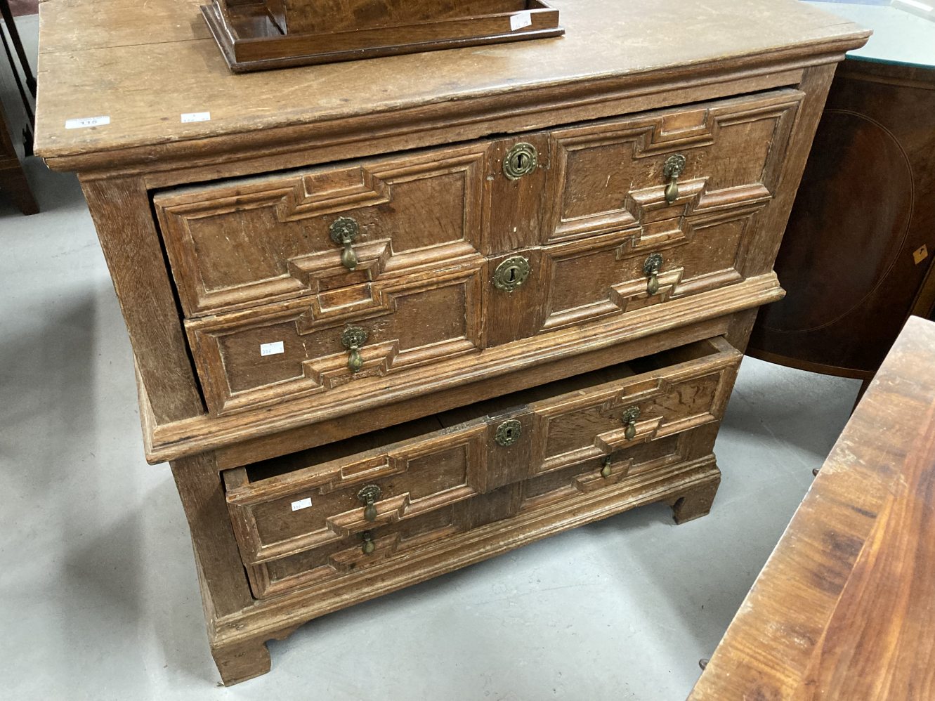 18th cent. English oak chest of four long drawers on bracket feet the moulded drawer fronts with