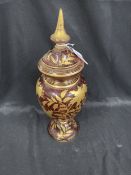 Late 19th/early 20th cent. Bohemian ruby glass urn and cover with gilt floral decoration. Approx.