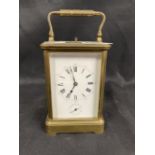 Clocks: 19th cent. French carriage alarm, repeater, striking on the half hours. White enamel dial