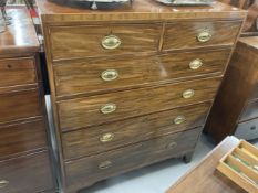 19th cent. Mahogany chest of two over four drawers on bracket supports, inlaid and cockbeaded.