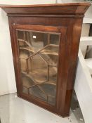 19th cent. Glazed mahogany corner cabinet. 30ins. x 17ins. x 38ins.