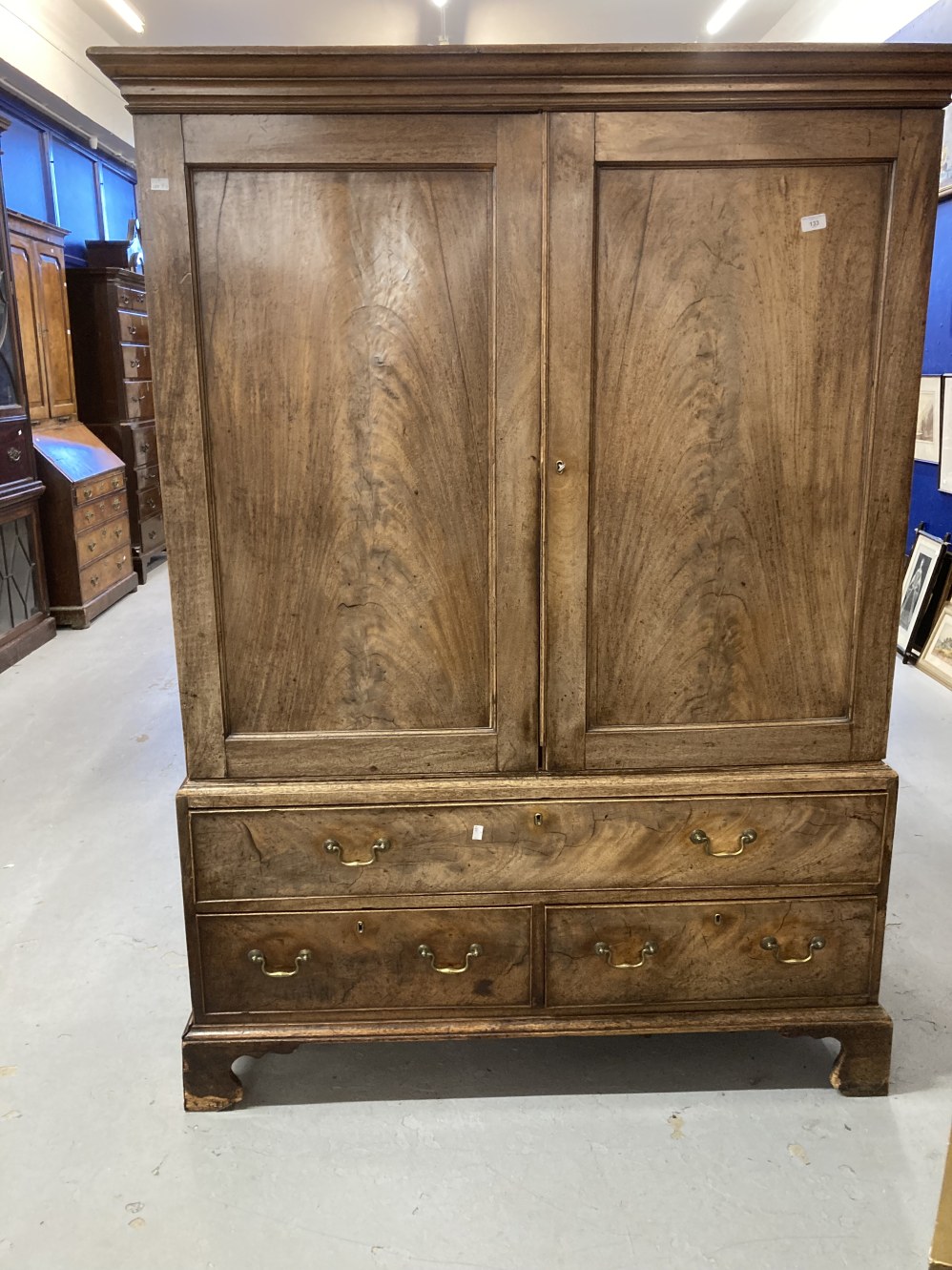 19th cent. Mahogany linen press with five sliders above one long and two short drawers on bracket - Image 4 of 5