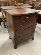 19th cent. Mahogany bow fronted graduated chest of four cockbeaded drawers of small proportions,