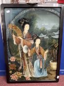 20th cent. Chinese reverse glass painting depicting two elegant ladies in a garden scene, framed.