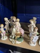 20th cent. Ceramics: Naples Capodimonte four putti angels musicians A/F, bisque figure of a mother